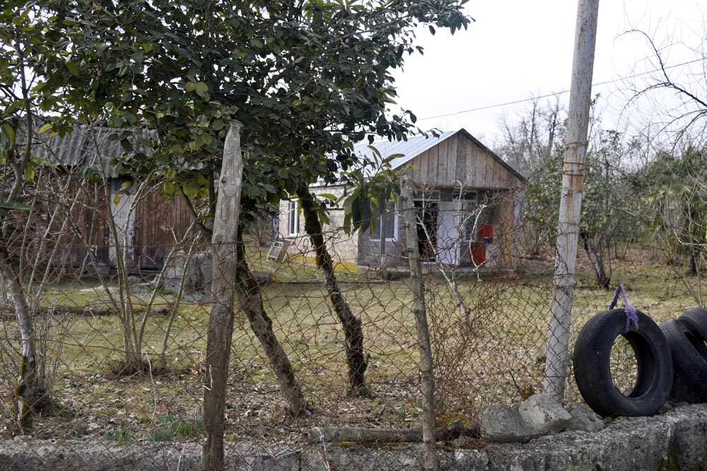 Burnt house was replaced by new one where mother-in-law lives.